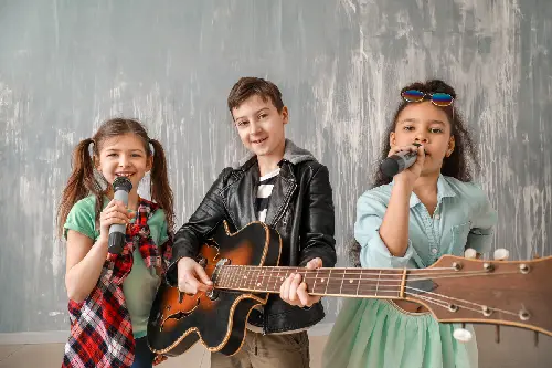 Band Of Little Musicians Against Grunge Wall