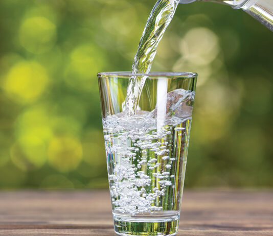 Water Pouring Into Glass