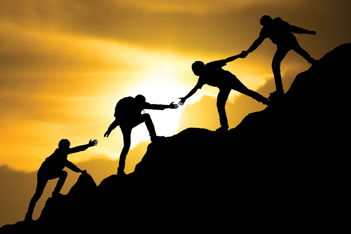 Group Of People On Peak Mountain Climbing Helping Team Work , Travel Trekking Success Business Concept