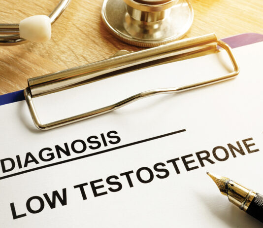 Diagnosis Low Testosterone And Pen On A Desk.