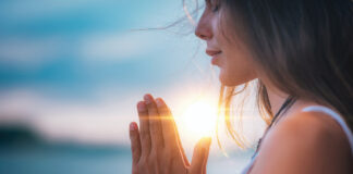 Meditating. Close Up Female Hands Prayer