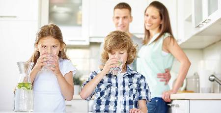 Family Drinking Water