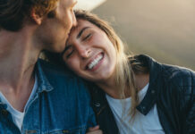 Romantic Boyfriend Kissing On Happy Girlfriend's Forehead