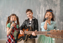 Band Of Little Musicians Against Grunge Wall